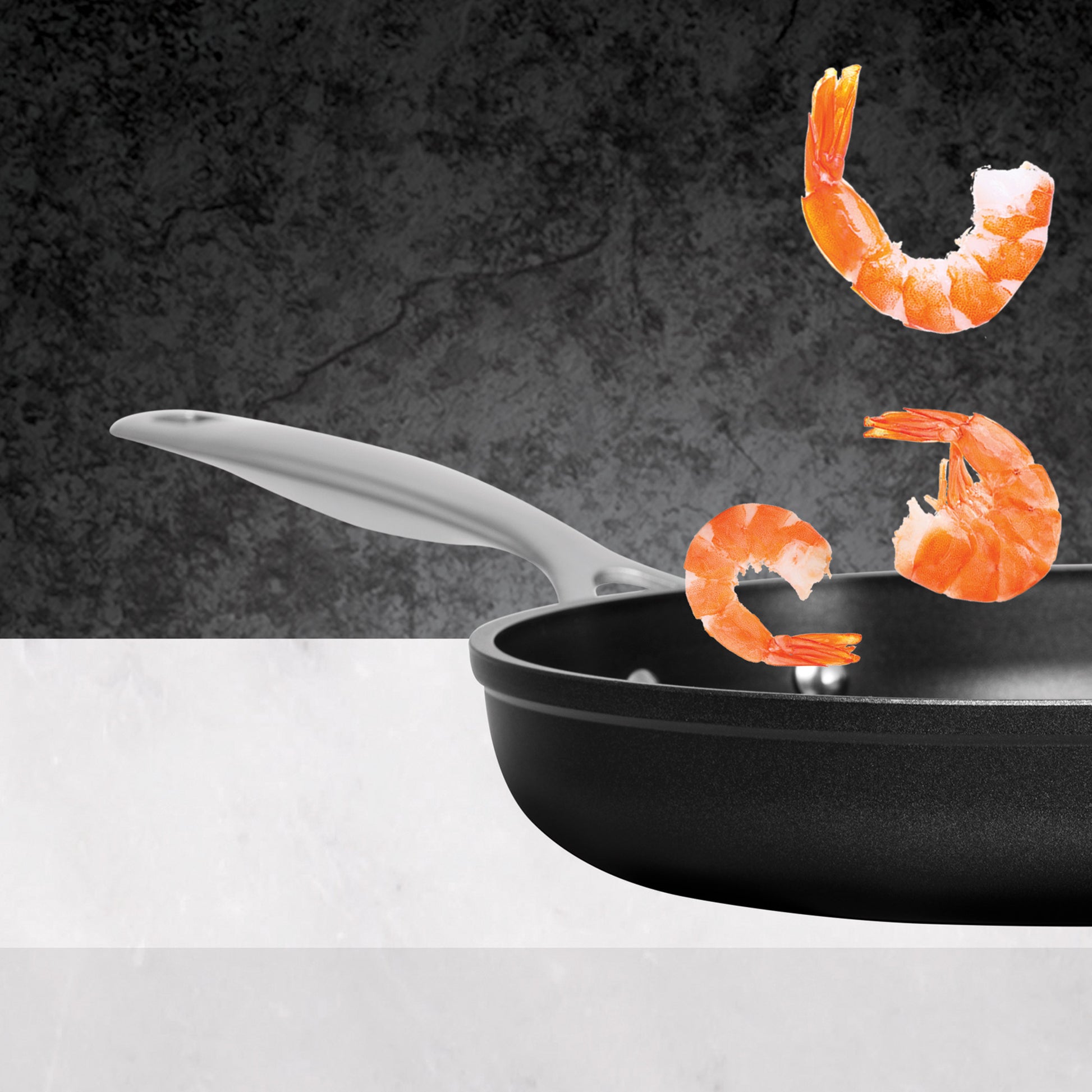 ignite Fry Pan flipping prawns