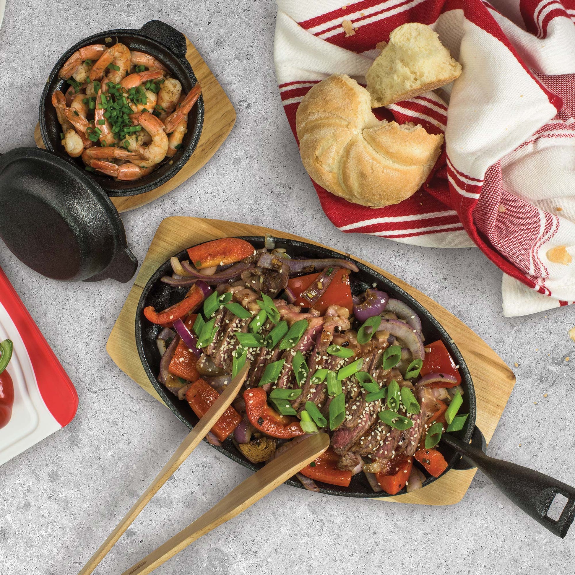 PYROCAST Oval Sizzle Plate with Maple Tray with food